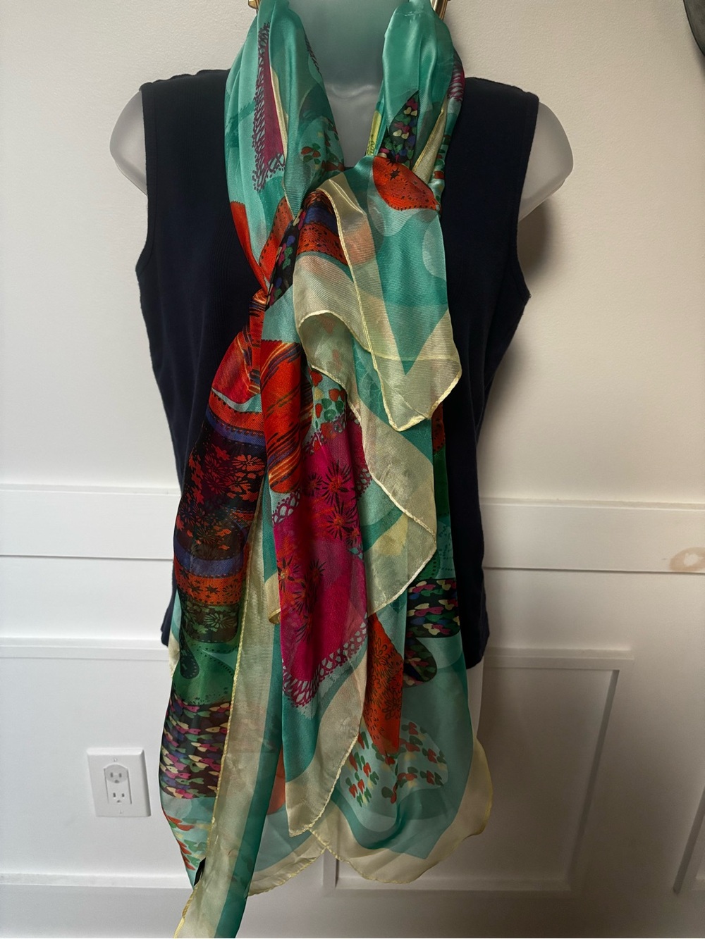 large  VTG scarf with a vibrant heart motif set against a light teal background